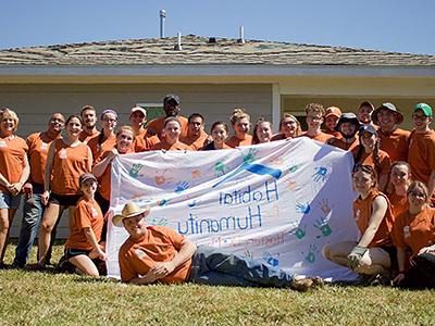 Image of Habitat for Humanity holing their sign